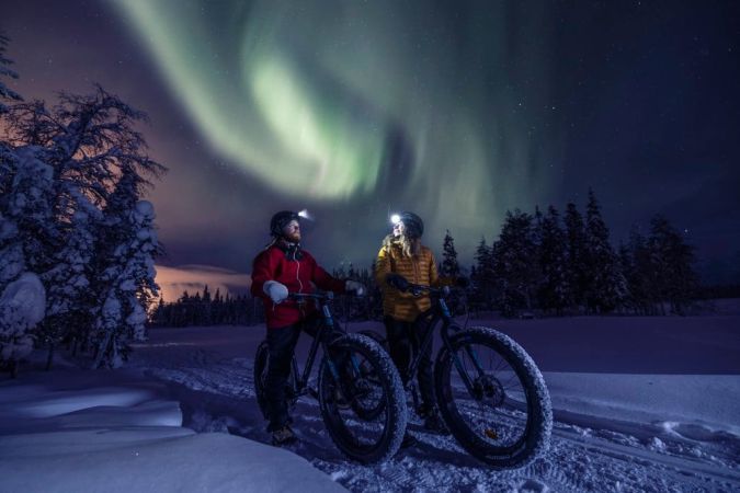 Fatbiking under the northern lights with Ruka Safaris