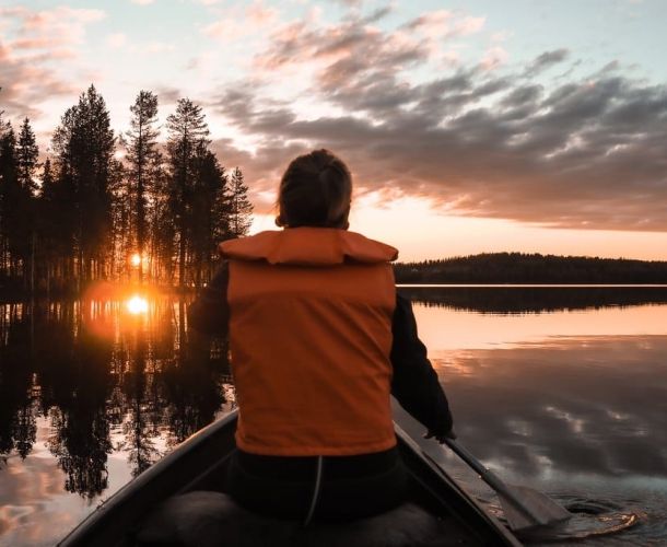 Canoeing in Ruka under the midnight sun